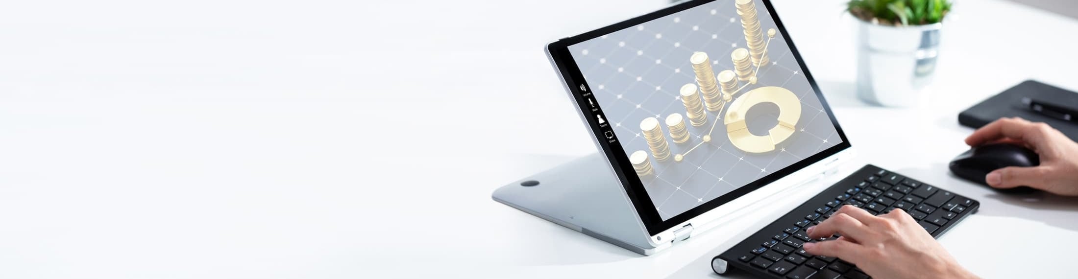 Professional workspace with a financial data visualization displayed on a computer screen.
